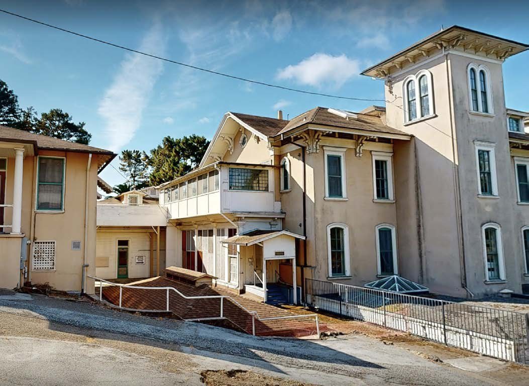 Later additions and ramps built against the historic house